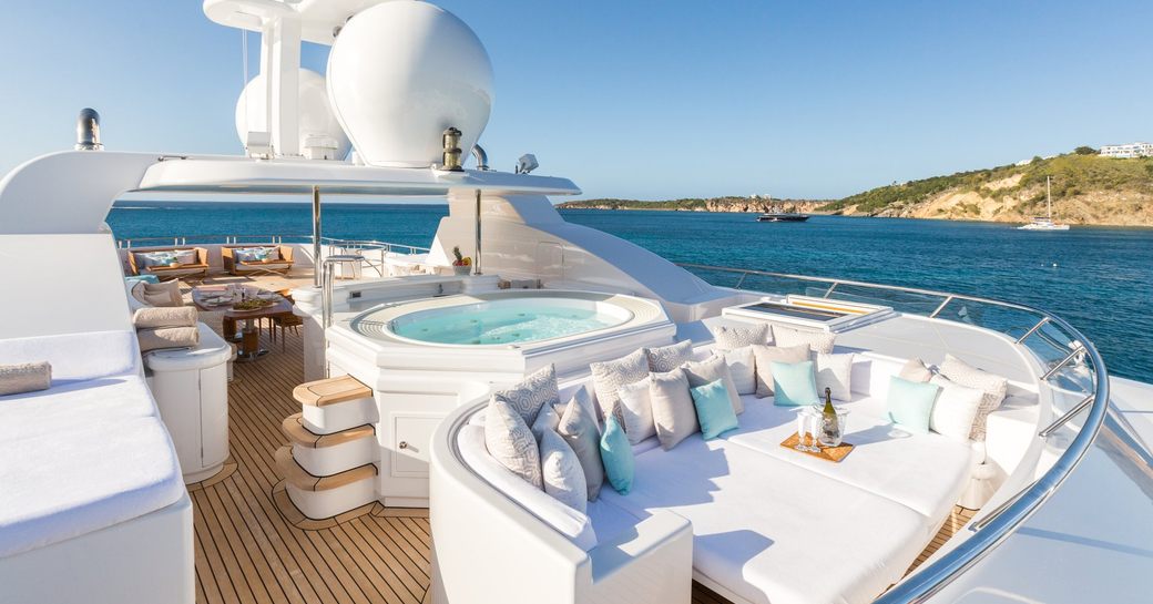 sunpads and Jacuzzi on the sundeck of luxury yacht HANIKON 