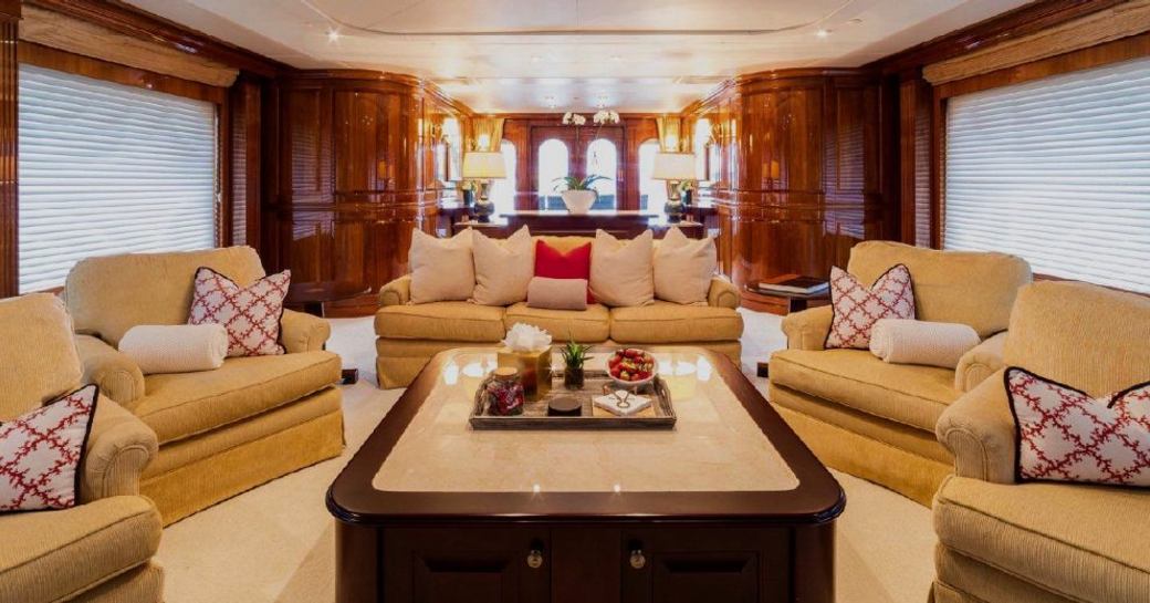 sumptuous seating in the main salon of superyacht One More Toy 