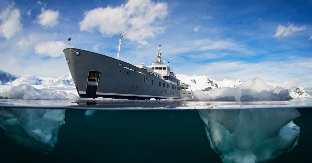 Expedition yacht Enigma XK at ease amongst the ice in Antarctica