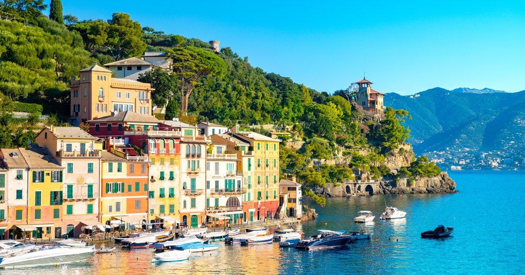 Houses by the water in town of Portofino, in Italy