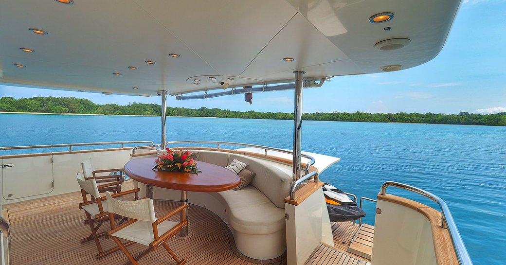 dining area on the aft deck of motor yacht ENCORE 