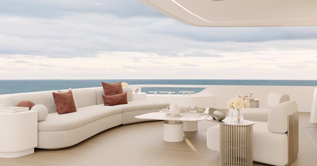 Aft deck rendering onboard Project 111.11. Exterior lounge area with sofas overlooking the sea.