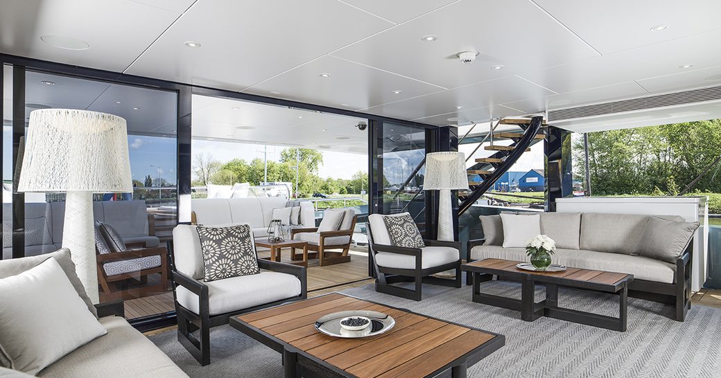 The winter garden style main salon on board luxury yacht IRISHA