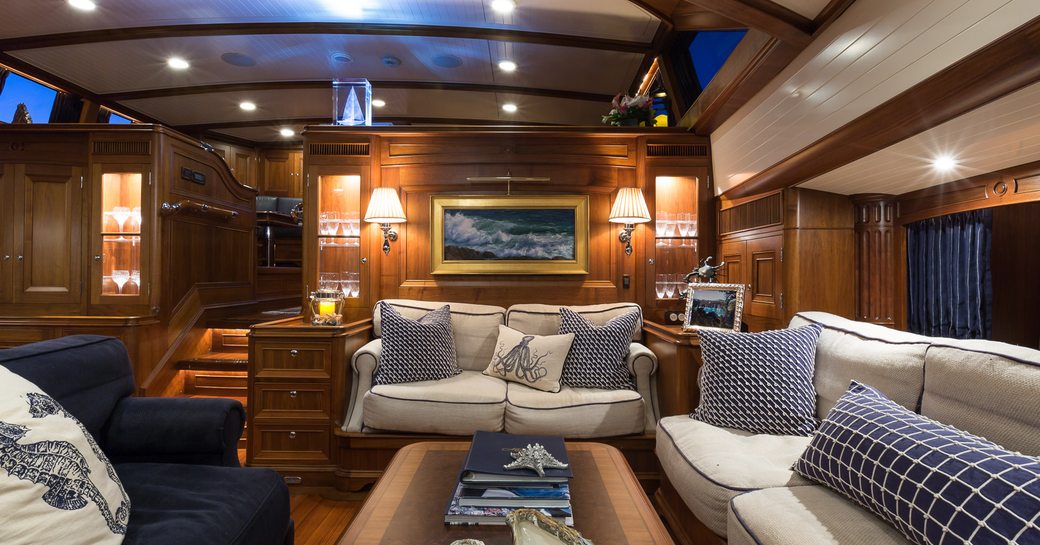 formal lounge with walnut panels on board superyacht MARAE 