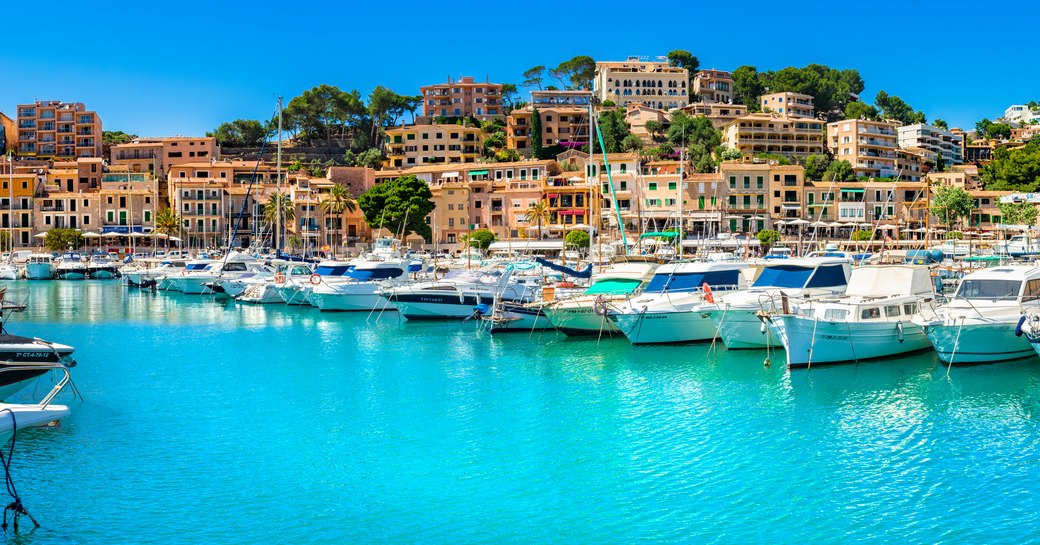 Panoramic view of beautiful Port de Soller boats yachts at coast of Mallorca island