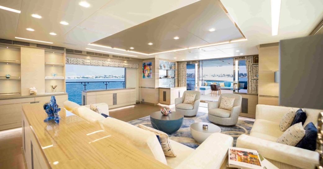 Main salon lounge onboard boat charter CHARADE