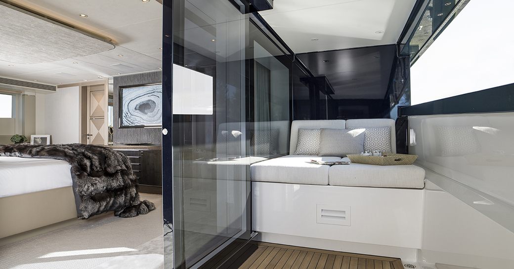 Owners cabin with retractable balcony on charter yacht IRISHA