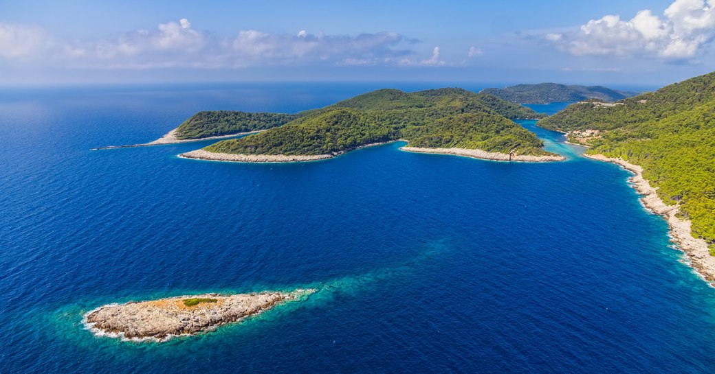 Aerial helicopter shoot of National park on island Mljet, Dubrovnik archipelago, Croatia. The oldest pine forest in Europe