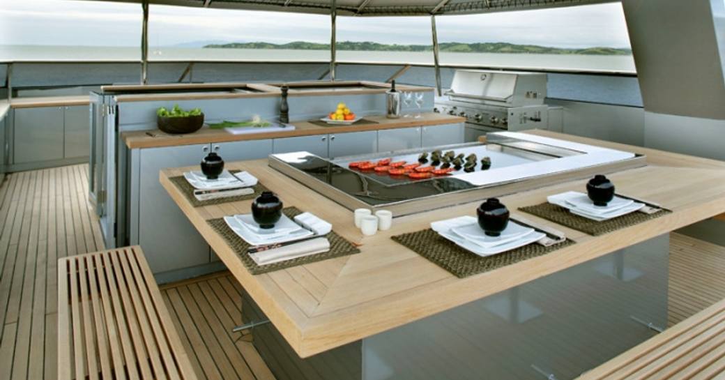 Superyacht VvS1's al fresco dining area offers stunning views of new zealand