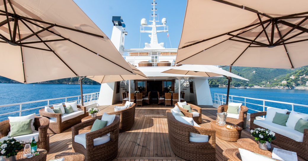 Bridge deck seating on board charter yacht BLEU DE NIMES