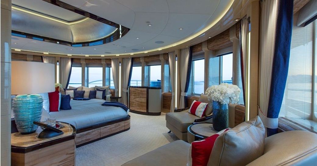 large master suite on superyacht Arience, with 180 degree views from windows