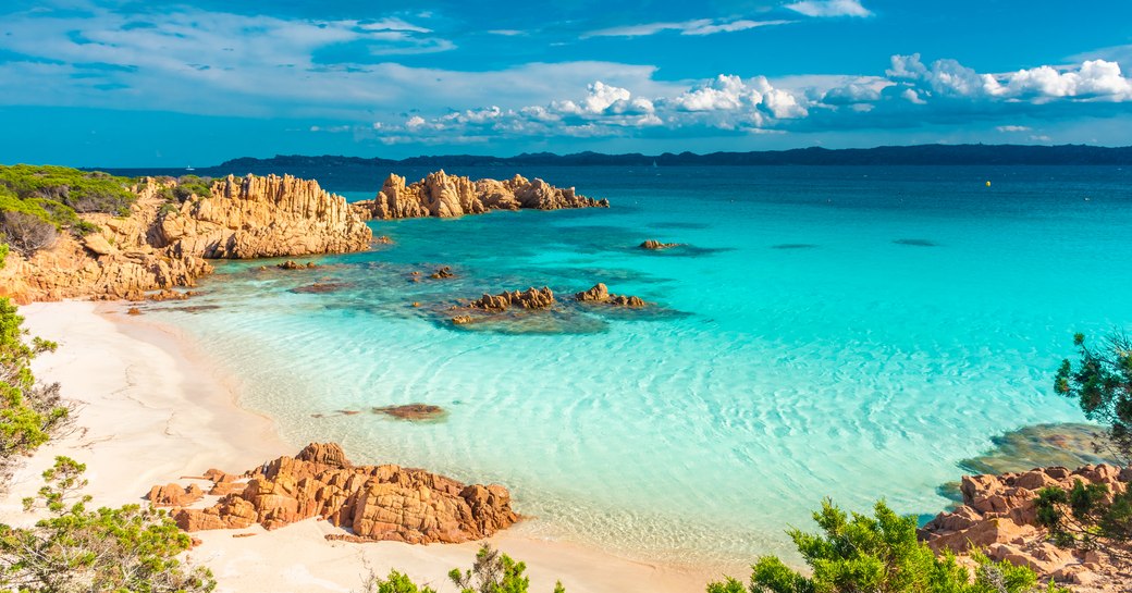 beautiful bay in Sardinia on a private yacht charter vacation