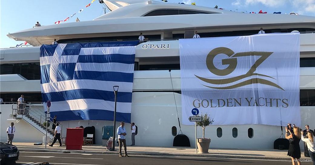 luxury yacht o'pari during delivery, with greek flag and shipyard flag on yacht