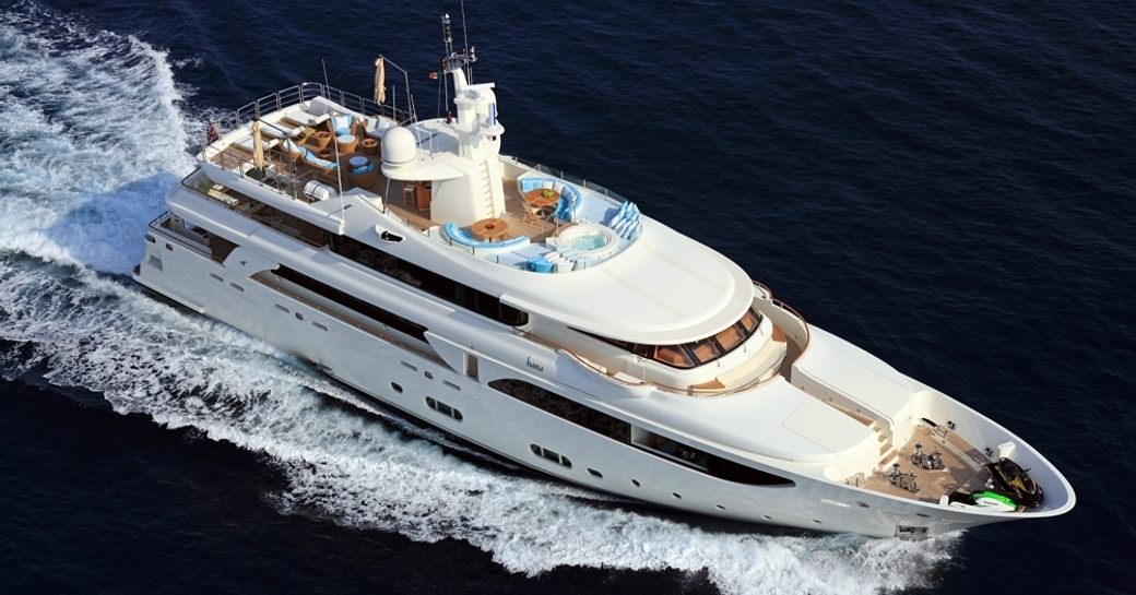 luxury yacht HANA cuts through the water on a luxury yacht charter 