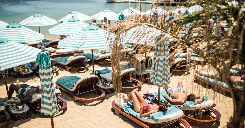 sun loungers at Nammos beach club, Mykonos, Greece