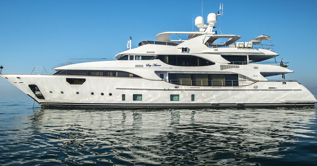 Luxury yacht Soy Amor profile shot anchor