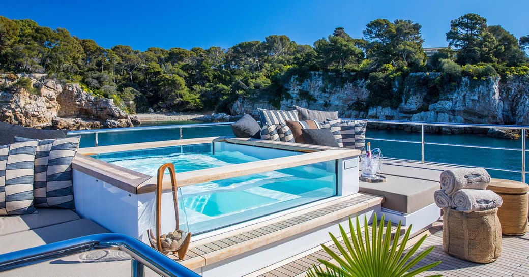 beautiful chic pool found aboard a luxury superyacht charter