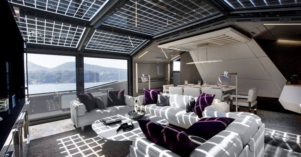 Main salon on luxury yacht Joy Star, with solar panels in ceiling