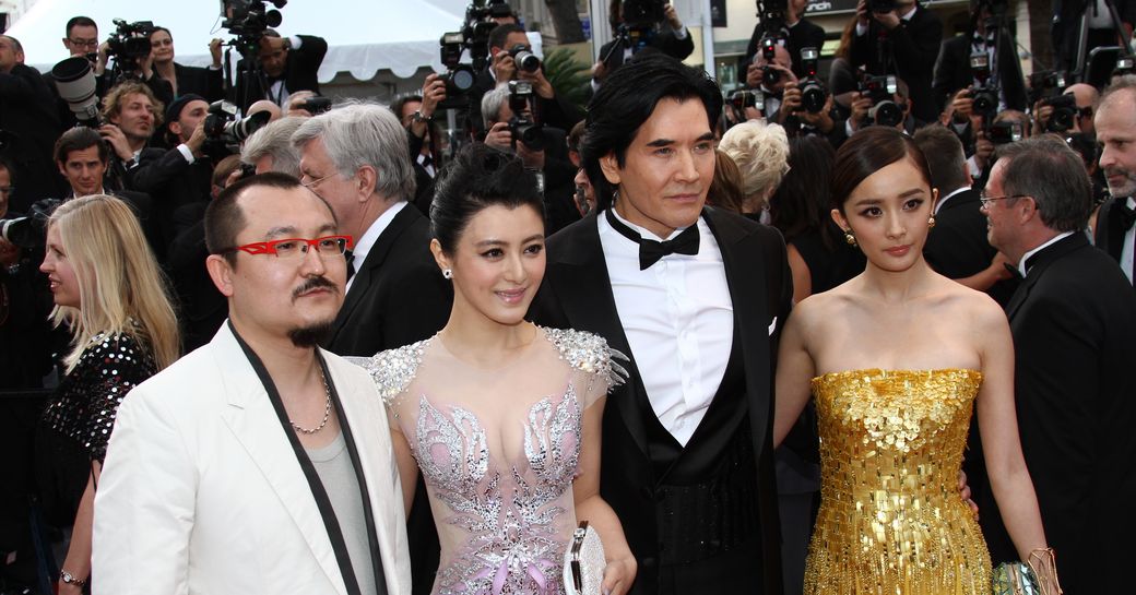 Actors pose at the Cannes Film Festival red carpet