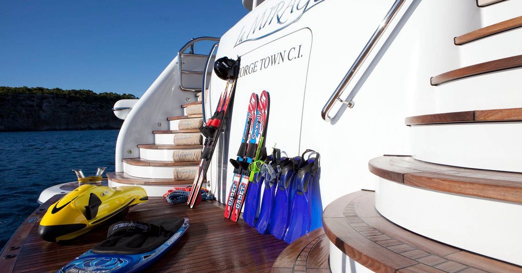 water toys laid out on the swim platform of motor yacht La Mirage 