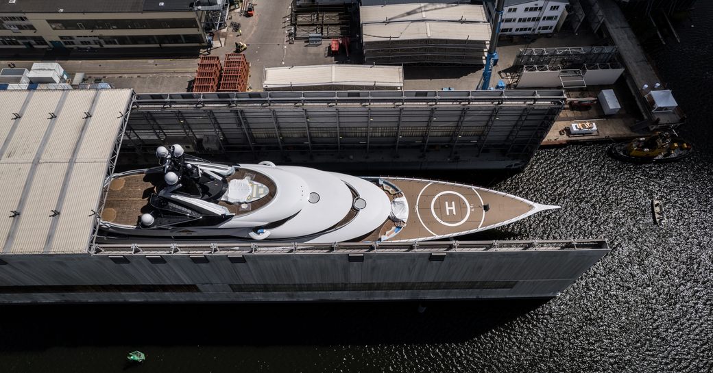Superyacht JAG in floating construction shed