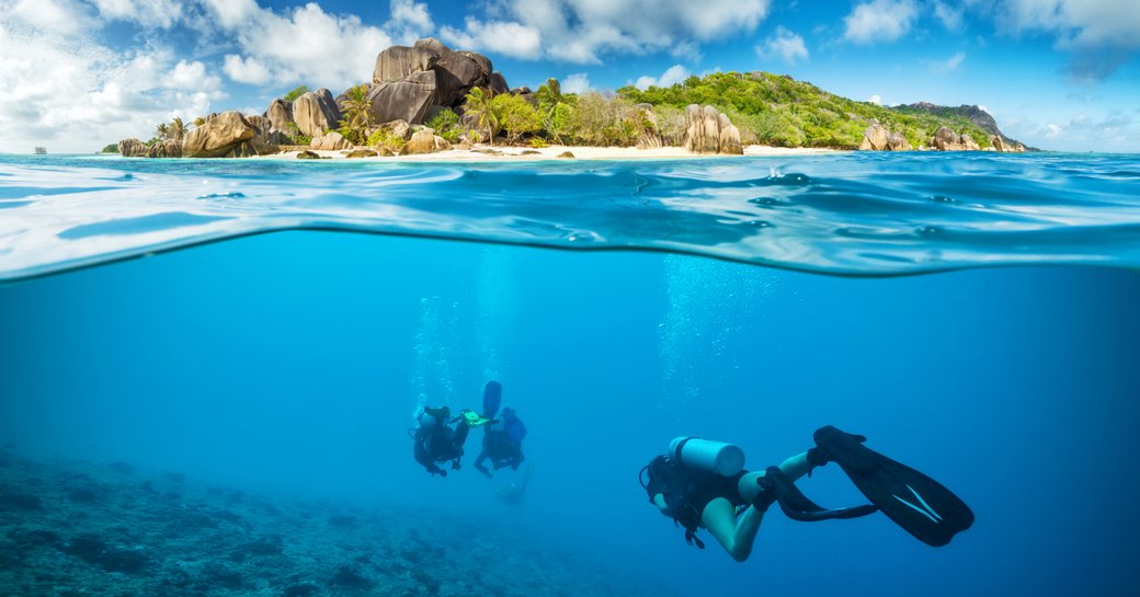 two people snorkeling in the Seychelles