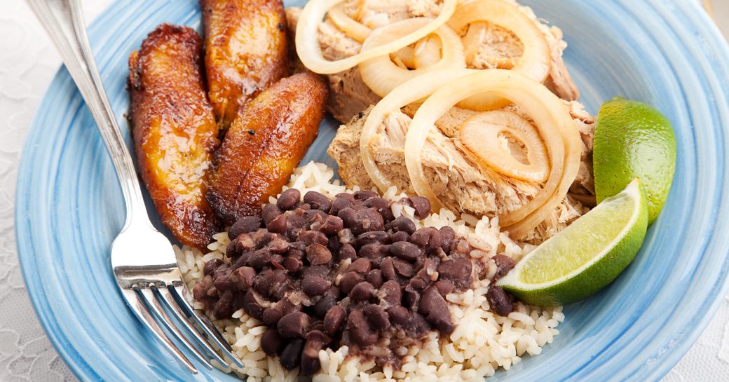 Popular Caribbean cuisine dish of plantain, black beans and rice