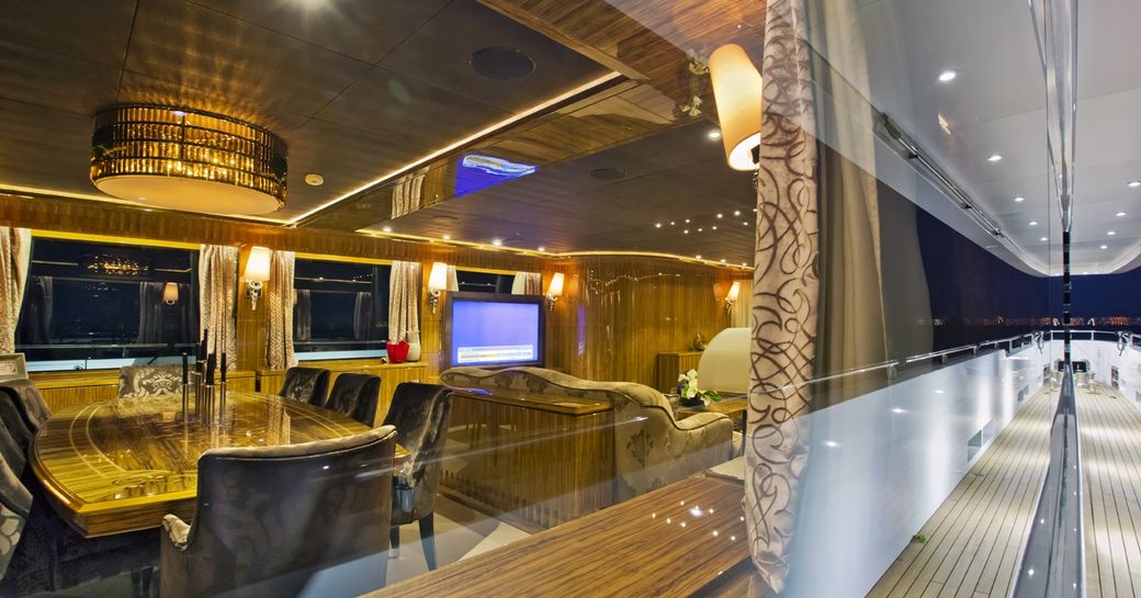 view of main salon on board charter yacht OKKO from wraparound deck