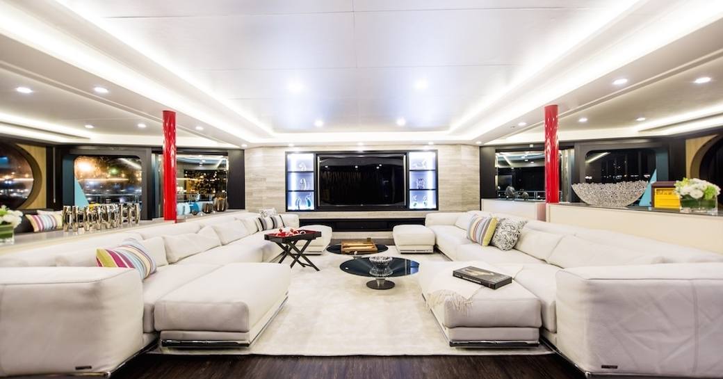 contemporary main salon with lounge area on board charter yacht SALUZI