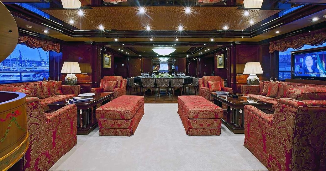 opulent and richly-coloured main salon aboard motor yacht ULYSSES 