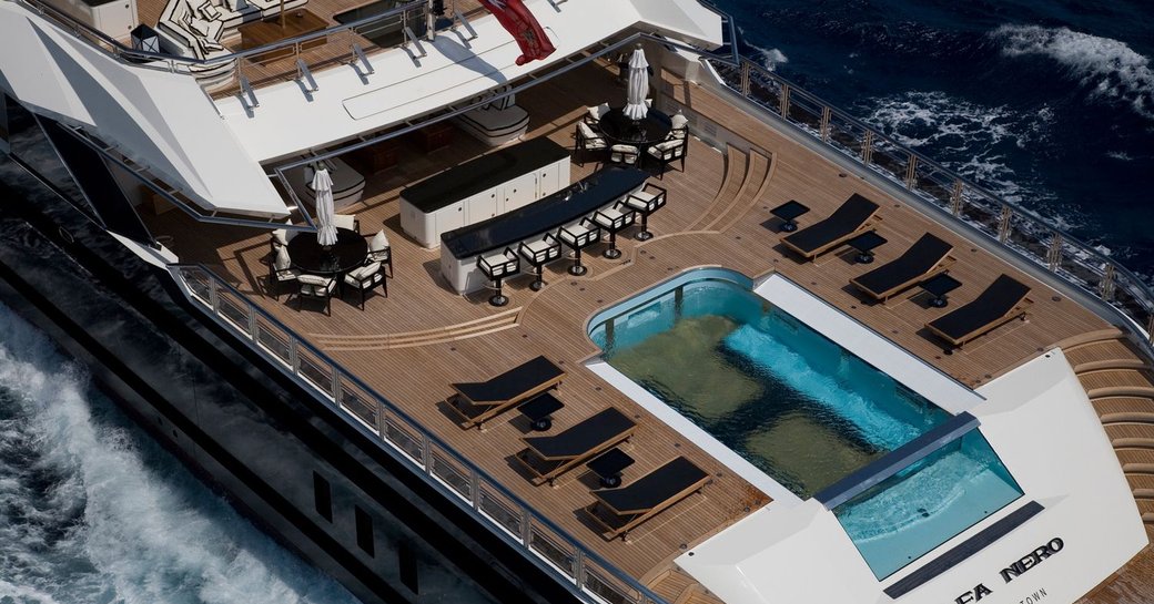 The large swimming pool featured on the aft of superyacht 'Alfa Nero'