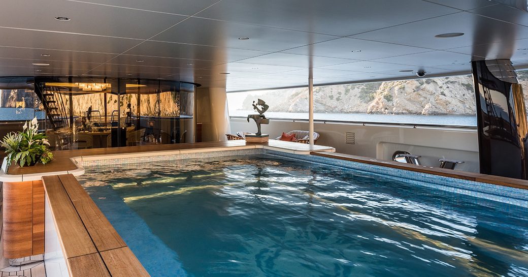 The swimming pool featured on board superyacht Here Comes The Sun