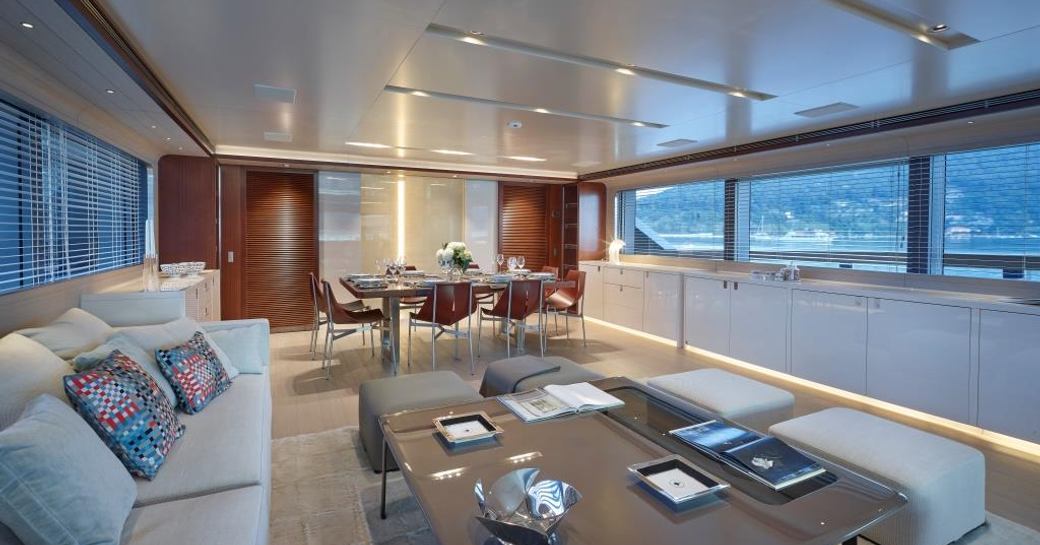 main salon with lounge and dining areas on board superyacht MOKA
