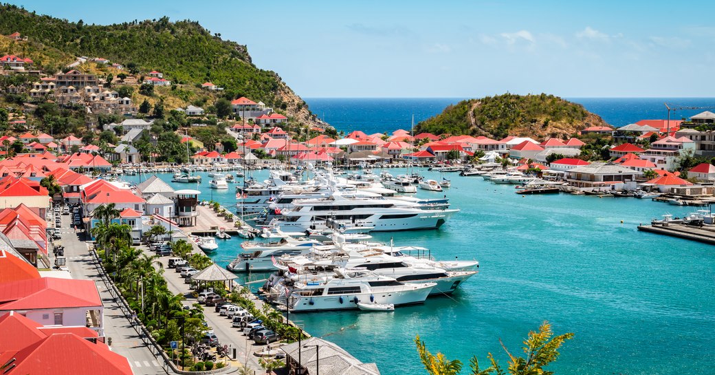 Gustavia Harbor on the island of St Barts, with many charter yachts berthed
