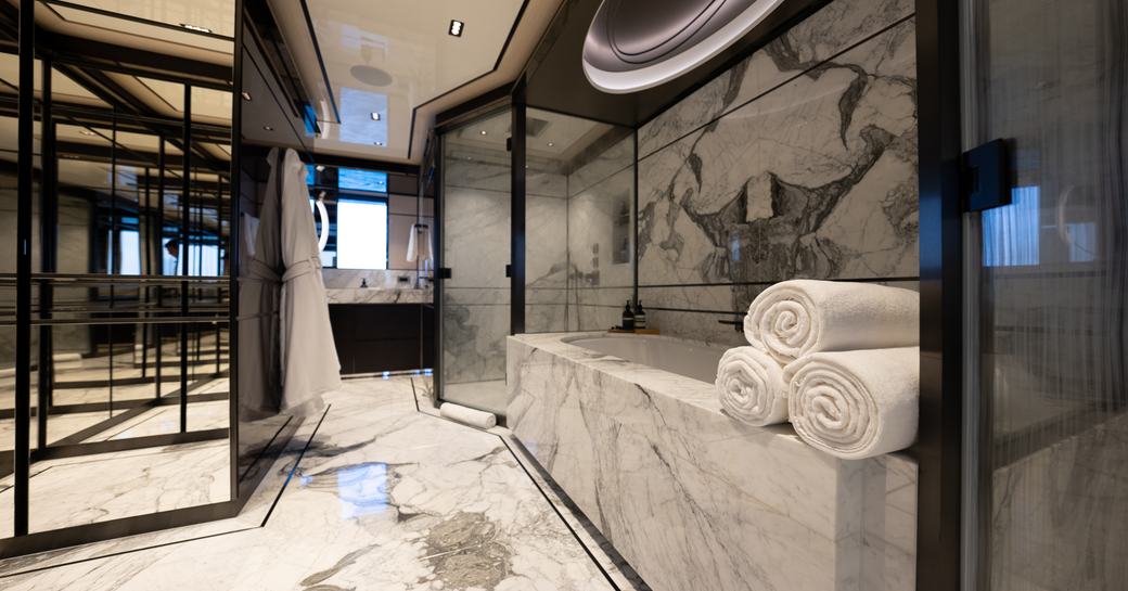 Spacious bathroom for the master cabin onboard charter yacht RELIANCE