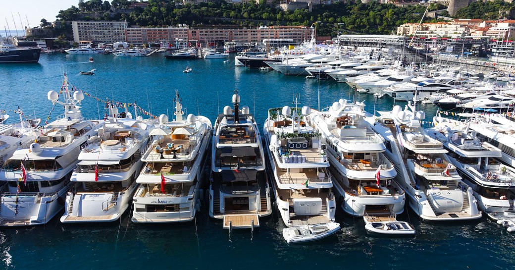 Superyachts lined up along Port Hercules harbour in Monaco during the Grand Prix