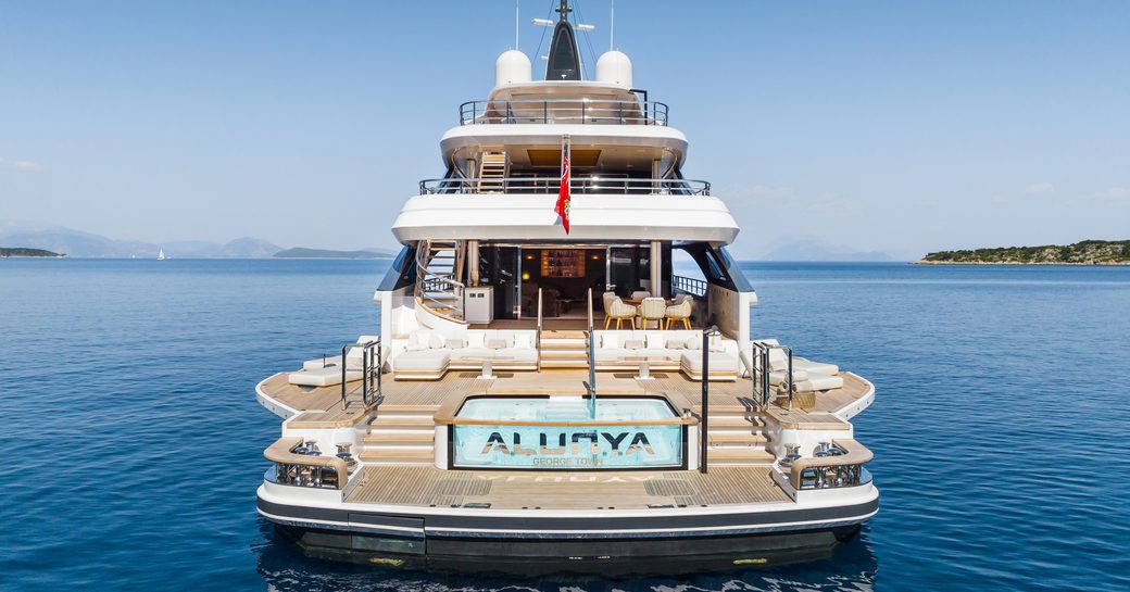 Charter yacht Alunya with her infinity pool and side decks extended