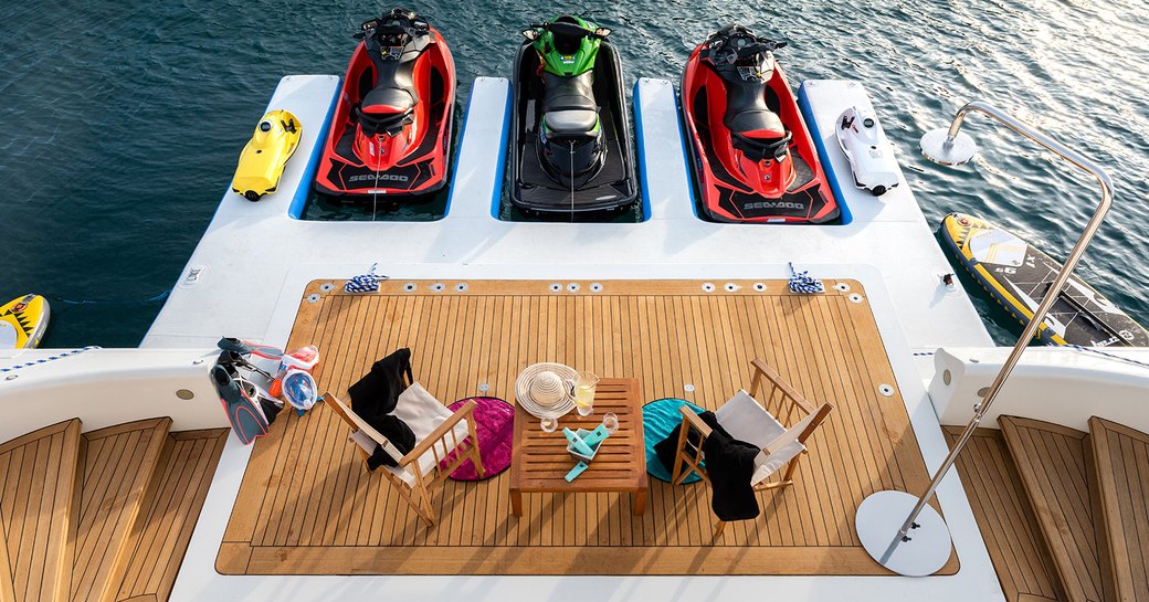 Swim platform and toys on board charter yacht AFRICA I