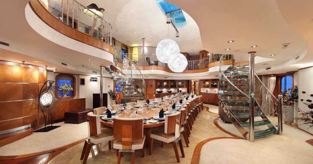 The expansive interior dining area on board luxury yacht SHERAKHAN