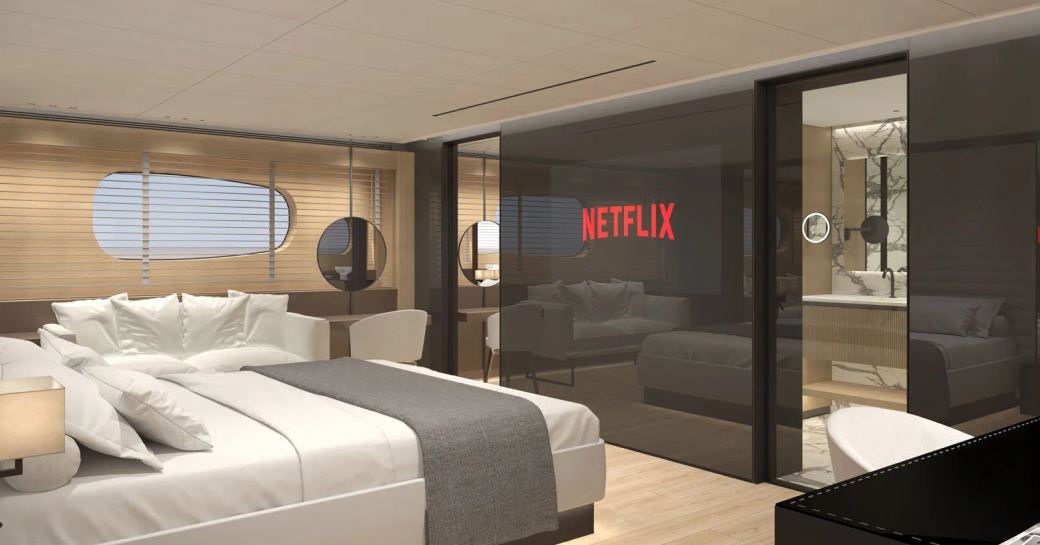 Master cabin rendering onboard charter yacht MAESTRO, with flatscreen TV opposite berth and visible entrance to private ensuite.