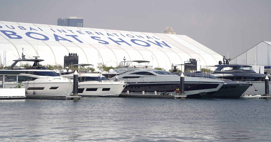 A line of motor yacht berthed at the Dubai International Boat Show