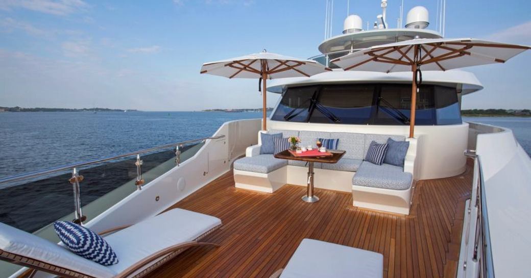seating area and sun loungers on the foredeck of luxury yacht Far Niente