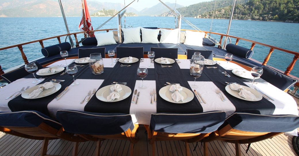 alfresco dining under awnings on aft deck of luxury yacht luxury gullet 'Queen of Datca'