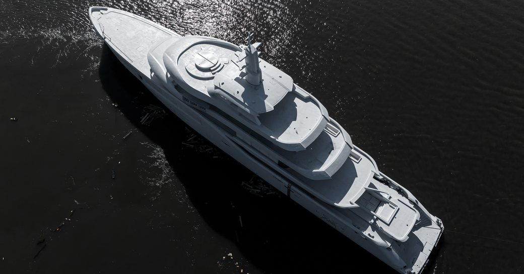 Aerial, bird's eye, view of Amels 8001 superyacht at sea.