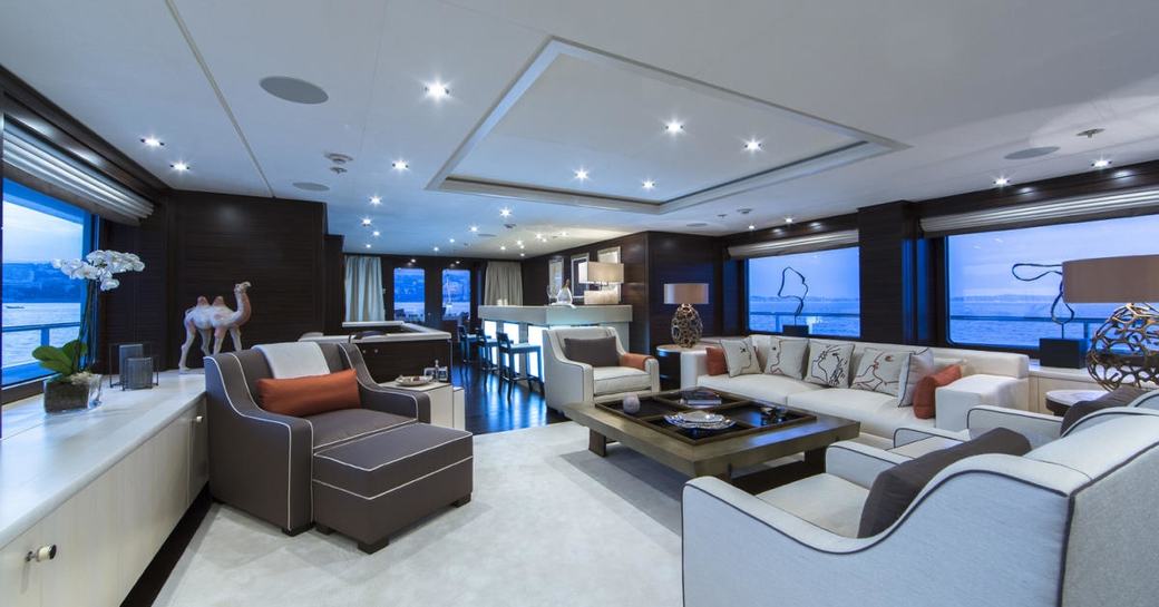 sofas and armchairs in the main salon of superyacht 4YOU