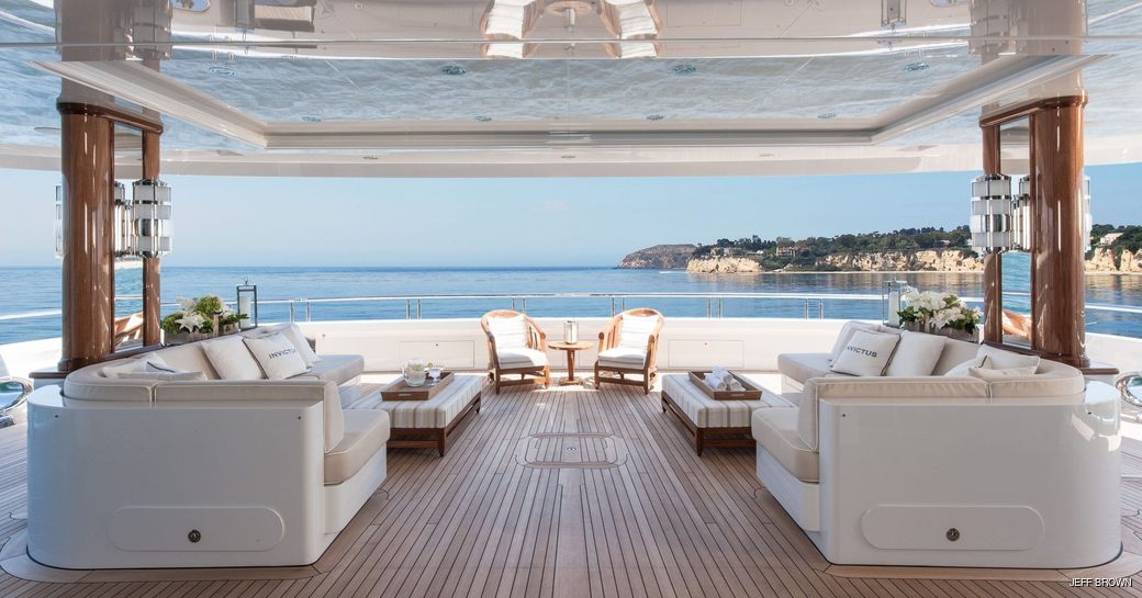 spacious lounge area on a luxury superyacht charter
