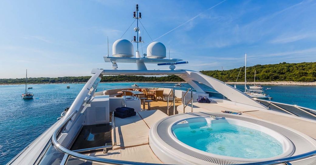 sundeck of motor yacht agram, with jacuzzi pool in foreground 