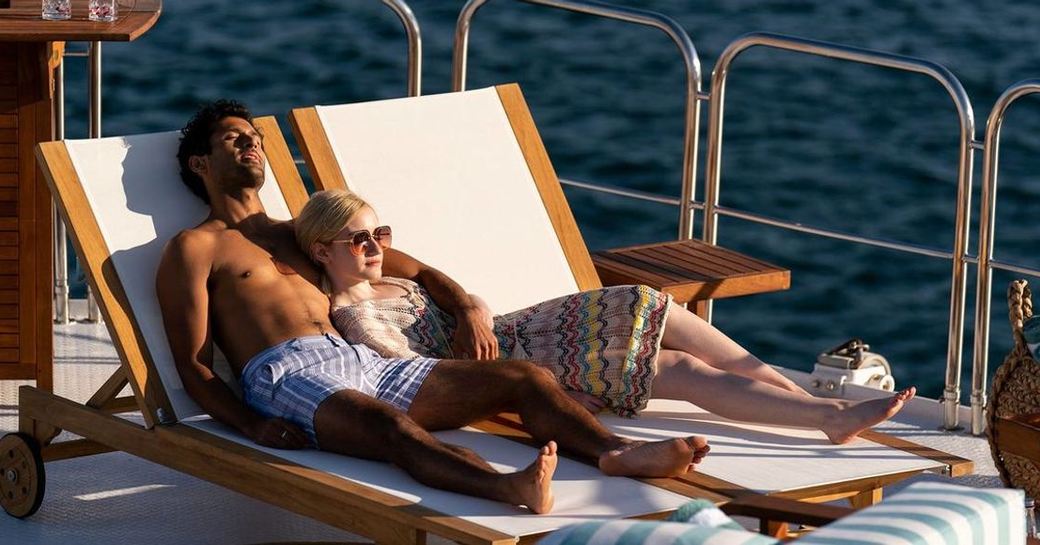 couple in Inventing Anna Netflix Drama, onboard luxurious superyacht