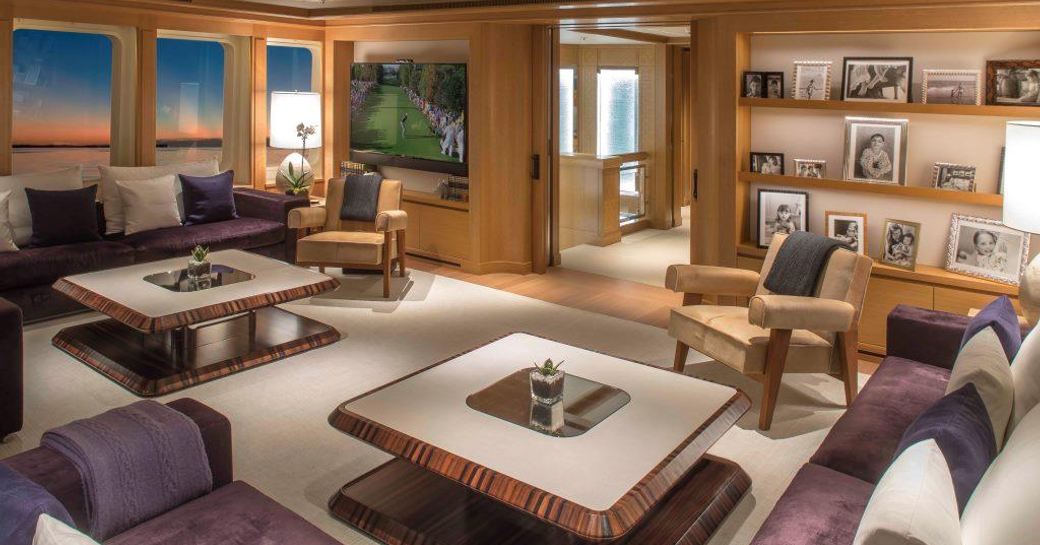 sociable lounge area in the main salon of charter yacht SAMADHI 