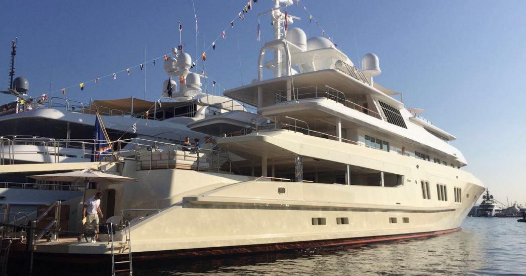 superyacht 'Coral Ocean' with bunting lines up in Port Hercules for the Monaco Yacht Show 2016